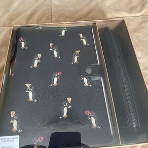 NWT Coach Boxed Notebook and Pencil Case Set
With Penguin Print